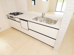 【Kitchen】
温かみのある木調の床と、清潔感のある白い空間が調和し、心地よい日常を予感させるキッチン。作業スペースの広がりと、自然な明るさが、毎日の暮らしに穏やかな彩りを与えてくれます。
